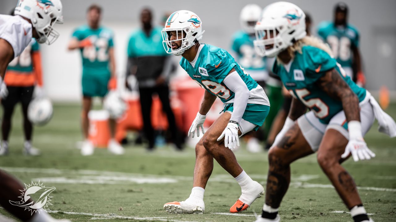 Miami Dolphins cornerback Elijah Hamilton (33) follows a play