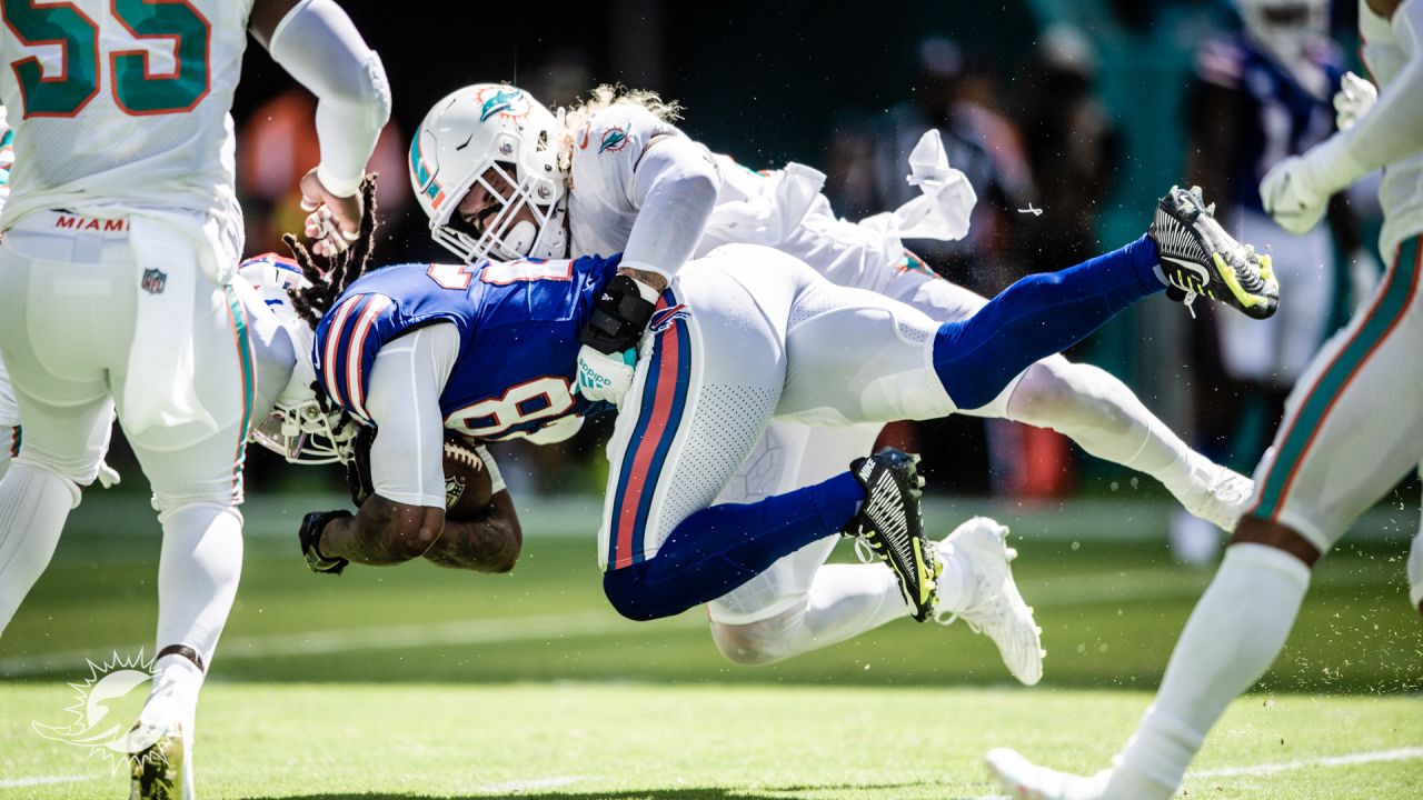 Buffalo Bills vs. Miami Dolphins. NFL Game. American Football League match.  Silhouette of professional player celebrate touch down. Screen in backgrou  Stock Photo - Alamy