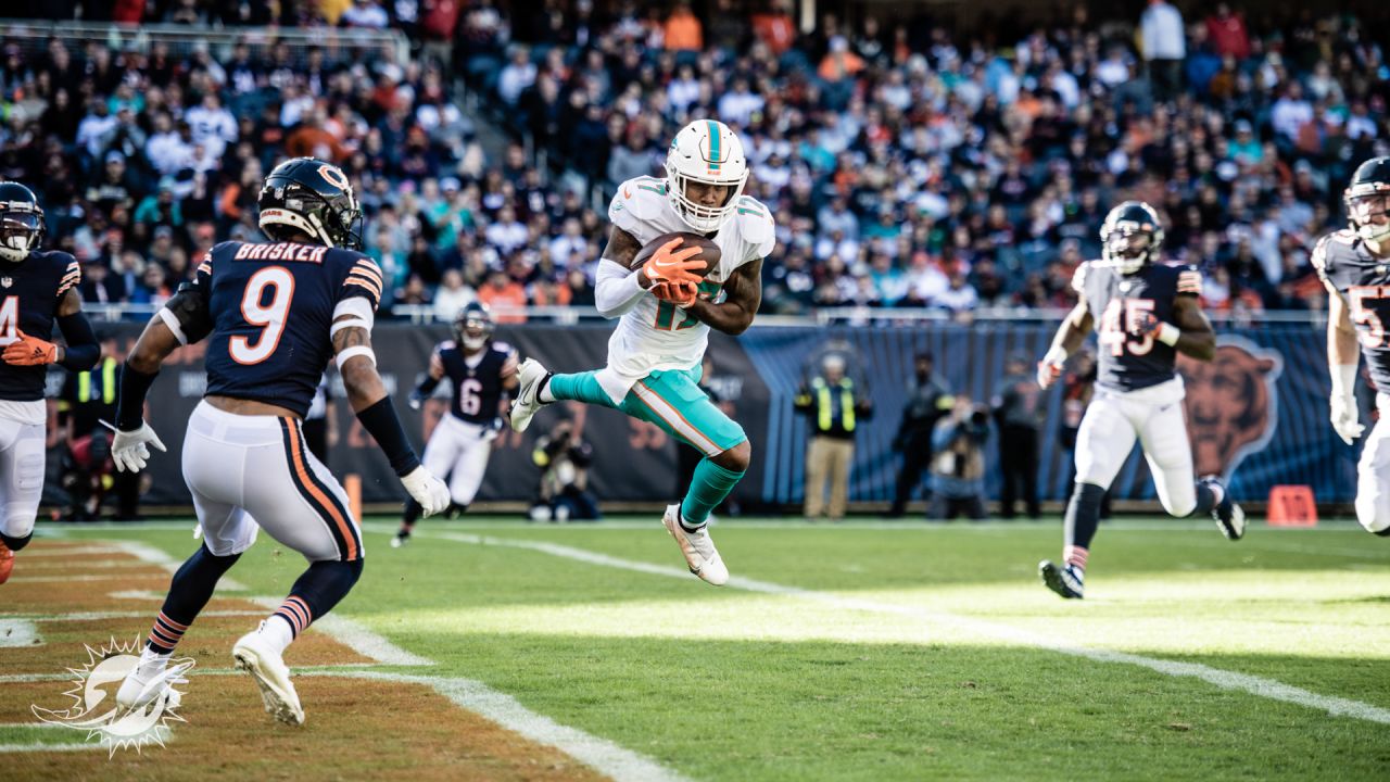 Miami Dolphins wide receivers Jaylen Waddle, right, and Tyreek Hill warm up  before the start of an NFL football game against the Chicago Bears, Sunday,  Nov. 6, 2022 in Chicago. (AP Photo/Charles