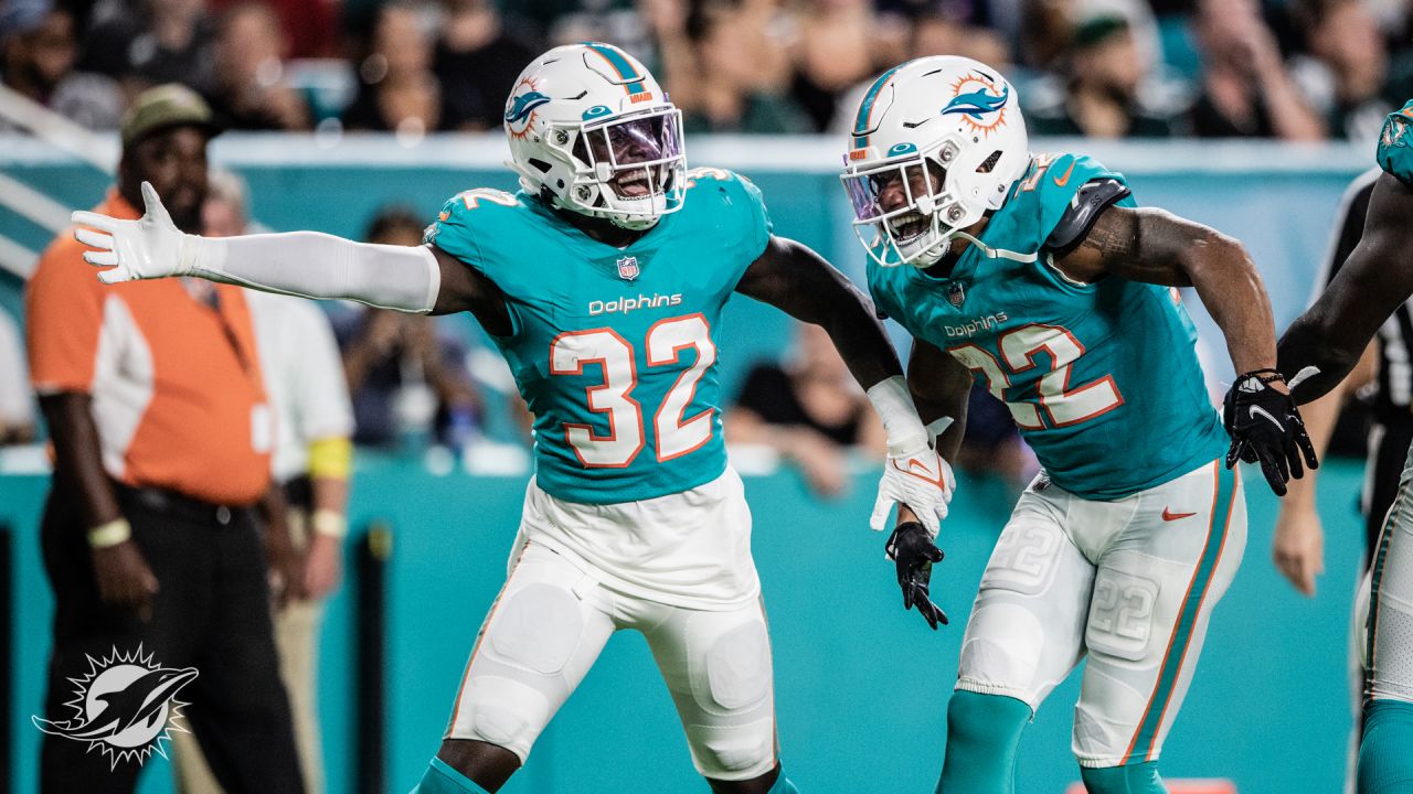 Miami Dolphins running back Salvon Ahmed (26) runs with the ball during an  NFL football game against the Philadelphia Eagles, Saturday, Aug. 27, 2022,  in Miami Gardens, Fla. (AP Photo/Doug Murray Stock