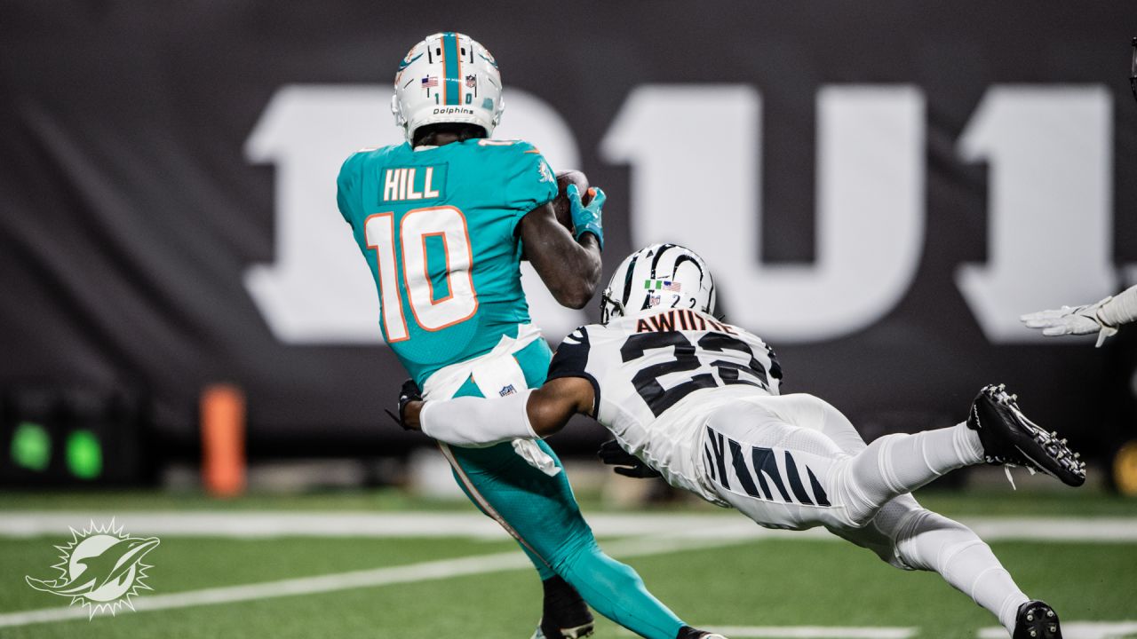 Miami Dolphins vs. Cincinnati Bengals. NFL Game. American Football League  match. Silhouette of professional player celebrate touch down. Screen in  bac Stock Photo - Alamy