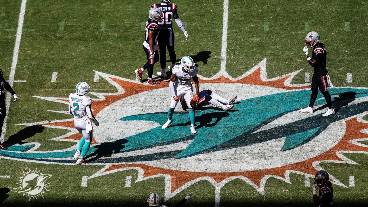 Miami Dolphins defensive end Emmanuel Ogbah (91) runs off the field  following an NFL football game against the New England Patriots, Sunday,  Sept. 12, 2021, in Foxborough, Mass. (AP Photo/Stew Milne Stock