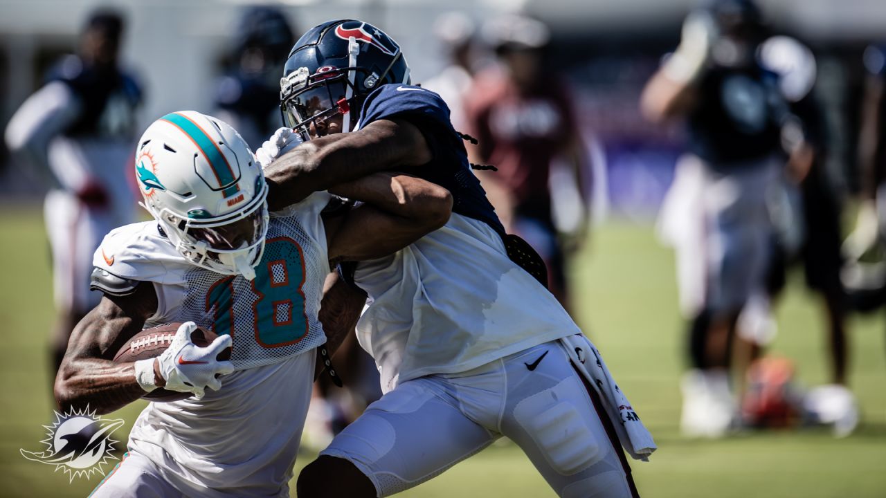 Miami Dolphins wide receiver Erik Ezukanma (18) runs with the