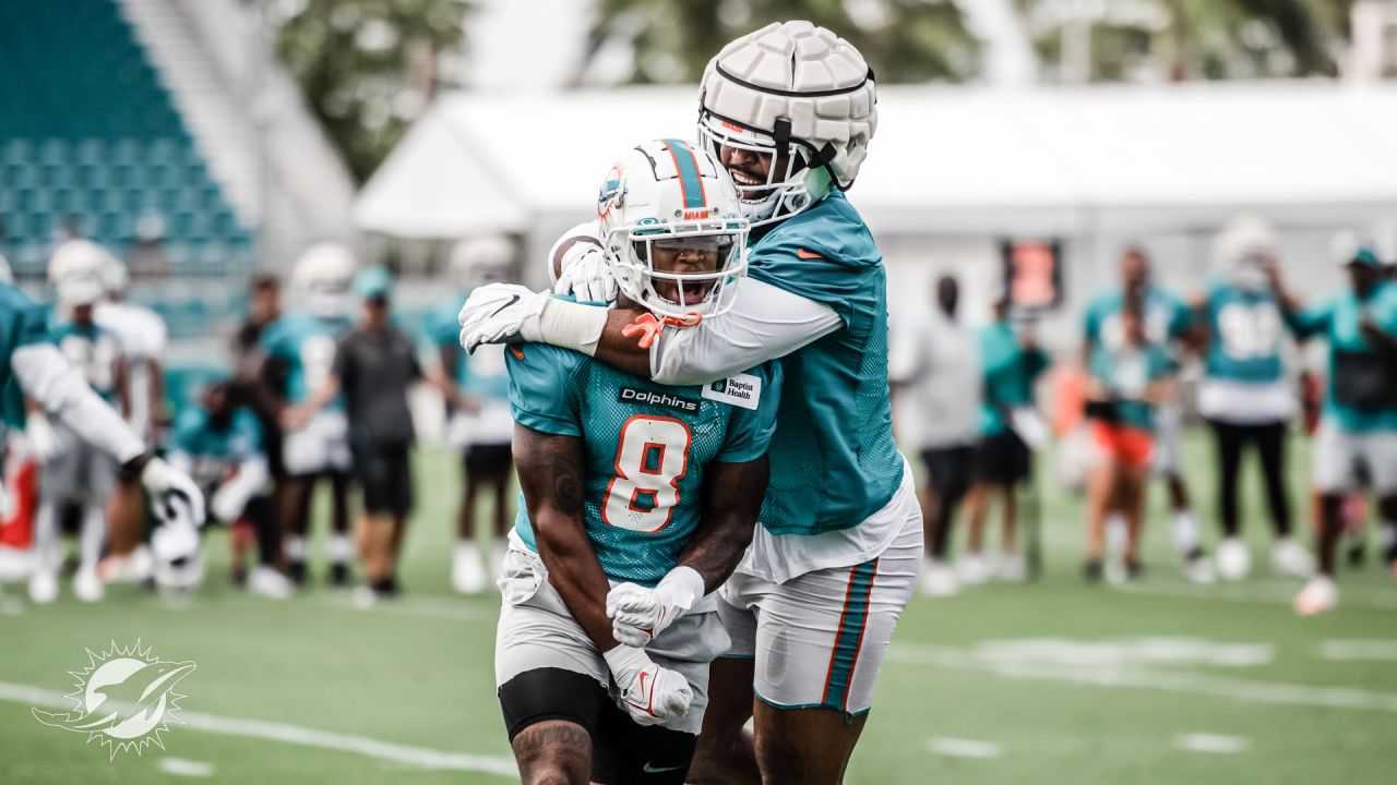 MIAMI GARDENS, FL - JULY 29: Miami Dolphins quarterback Too Tagovaloa (1)  listens to a coach in between drills during the Miami Dolphins training camp  on Friday, July 29, 2022 at Baptist