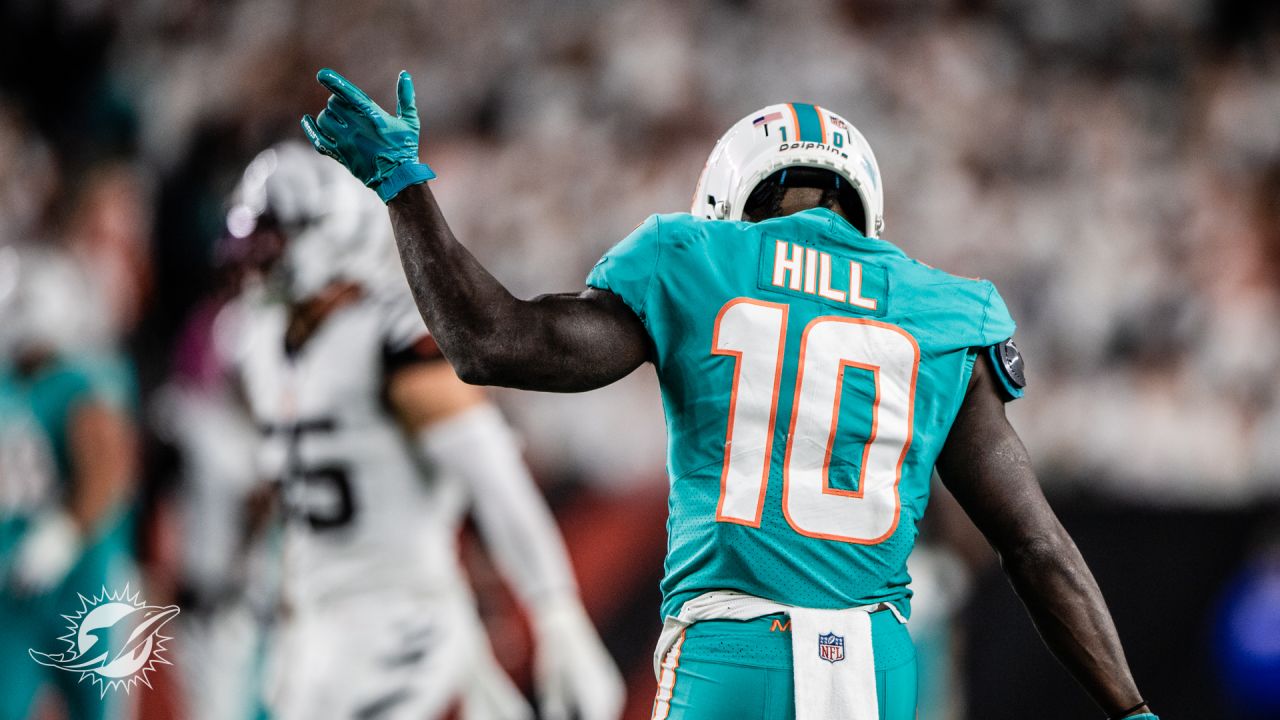 Miami Dolphins vs. Cincinnati Bengals. NFL Game. American Football League  match. Silhouette of professional player celebrate touch down. Screen in  bac Stock Photo - Alamy