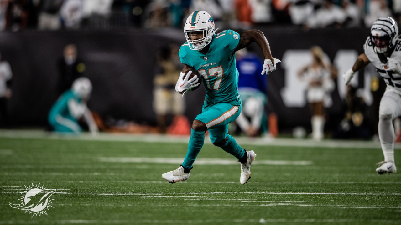 Miami Dolphins vs. Cincinnati Bengals. NFL Game. American Football League  match. Silhouette of professional player celebrate touch down. Screen in  bac Stock Photo - Alamy