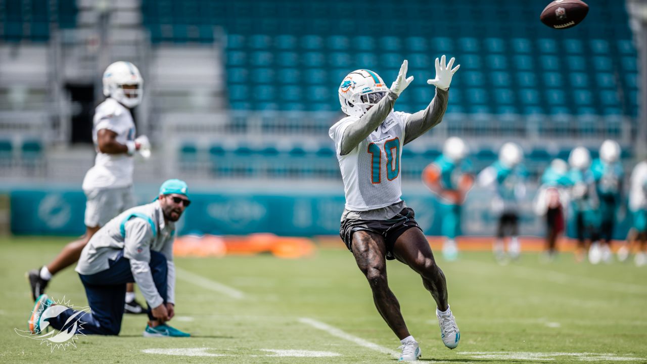 Miami Dolphins wide receiver Tyreek Hill (10) looks on during NFL football training  camp at Baptist Health Training Complex in Hard Rock Stadium on Thursday,  Sept. 1, 2022 in Miami Gardens, Fla. (