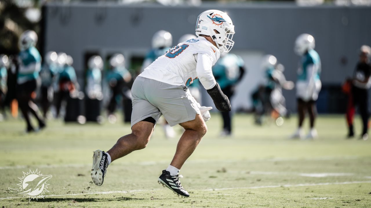 Miami Dolphins wide receiver Erik Ezukanma (18) runs with the football  during NFL football practice at Baptist Health Training Complex in Hard  Rock Stadium on Wednesday, Sept. 14, 2022 in Miami Gardens