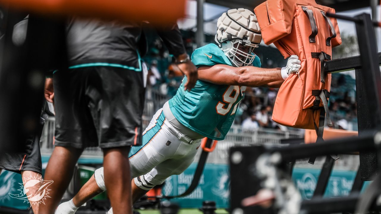 Miami Dolphins defensive tackle Zach Sieler (92) walks back to the