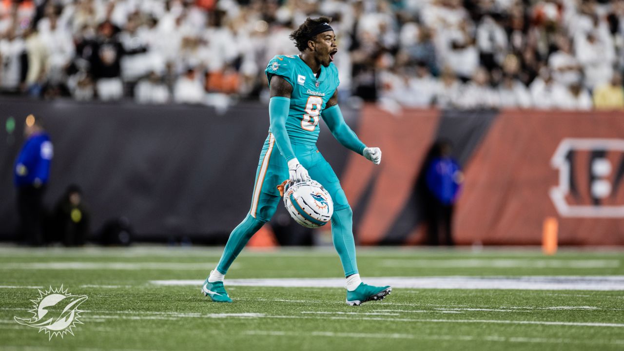 Miami Dolphins vs. Cincinnati Bengals. NFL Game. American Football League  match. Silhouette of professional player celebrate touch down. Screen in  bac Stock Photo - Alamy