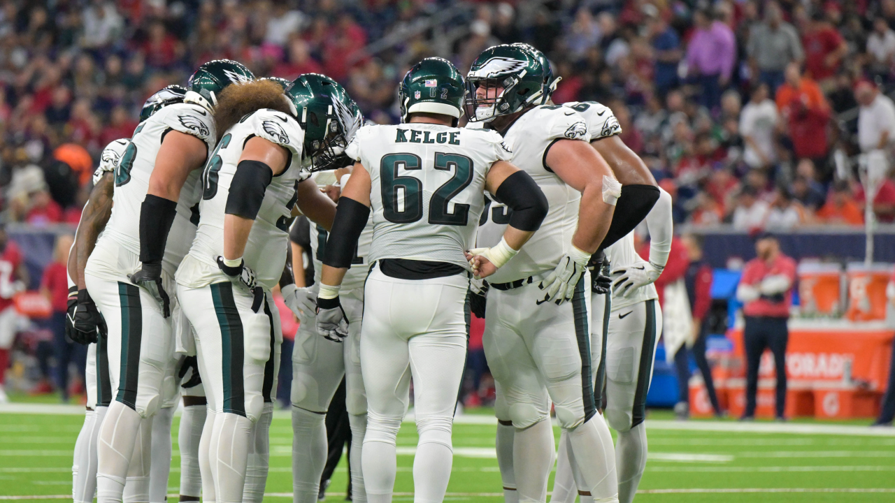 PHILADELPHIA, PA - NOVEMBER 14: Washington Commanders quarterback Carson  Wentz (11) and Philadelphia Eagles defensive end Brandon Graham (55) pray  after the game between the Washington Commanders and the Philadelphia Eagles  on