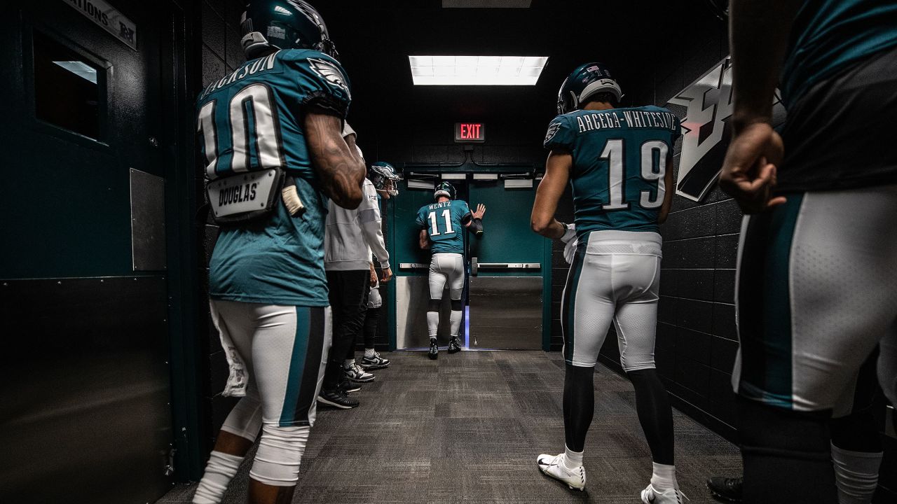 Prior to the Eagles first home game Carson Wentz leads a prayer