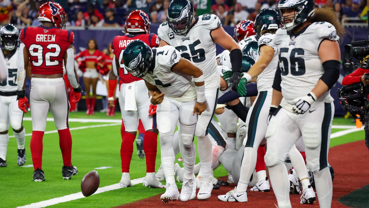 PHILADELPHIA, PA - NOVEMBER 14: Washington Commanders quarterback Carson  Wentz (11) and Philadelphia Eagles defensive end Brandon Graham (55) pray  after the game between the Washington Commanders and the Philadelphia Eagles  on