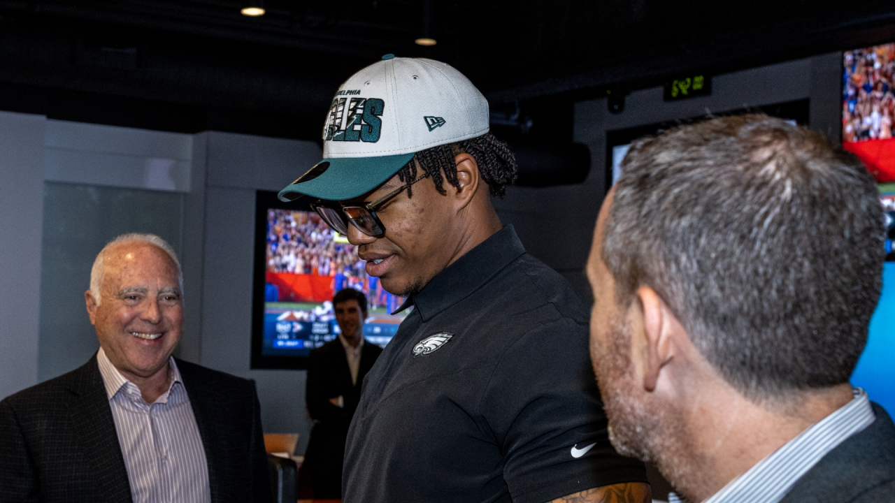 Georgia defensive lineman Jalen Carter, left, stands with NFL Commissioner  Roger Goodell after being chosen by the Philadelphia Eagles with the ninth overall  pick during the first round of the NFL football