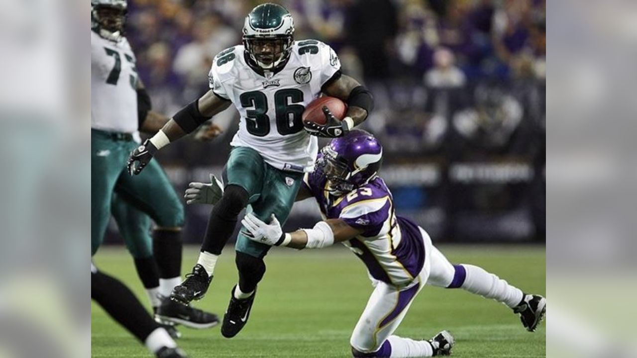 Philadelphia Eagles Brian Westbrook jumps over the pile and into