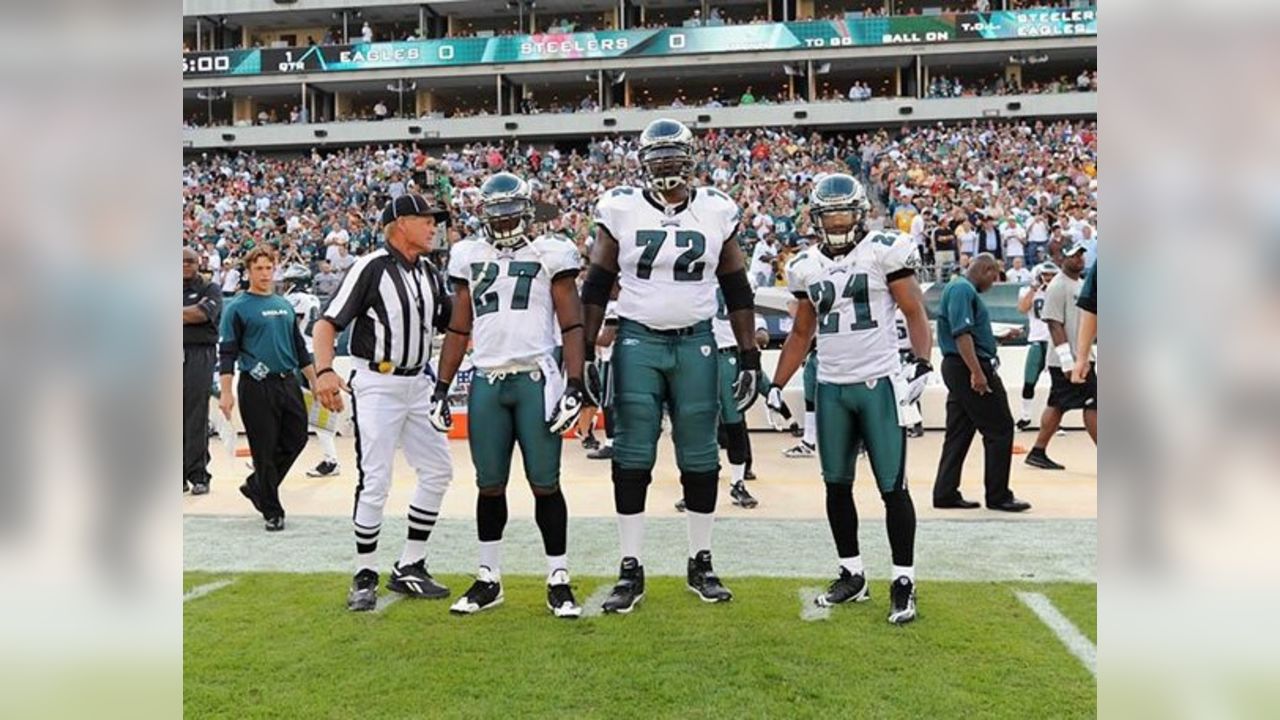 Philadelphia Eagles Alumni Willie Thomas, right, poses with a member of the  military before playing a game of flag football during practice at NFL football  team's training camp, Saturday, July 30, 2022