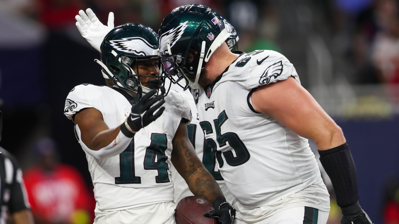 PHILADELPHIA, PA - NOVEMBER 14: Washington Commanders quarterback Carson  Wentz (11) and Philadelphia Eagles defensive end Brandon Graham (55) pray  after the game between the Washington Commanders and the Philadelphia Eagles  on