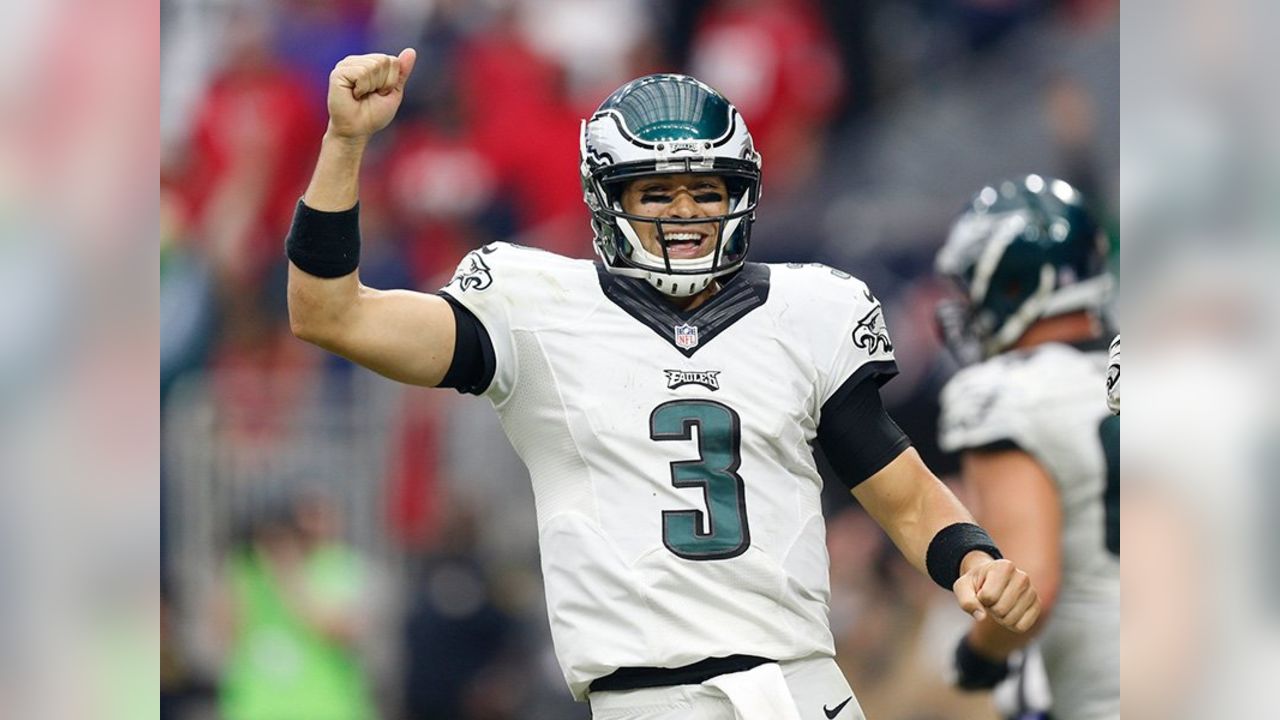 New York Jets Mark Sanchez takes off his helmet after greeting