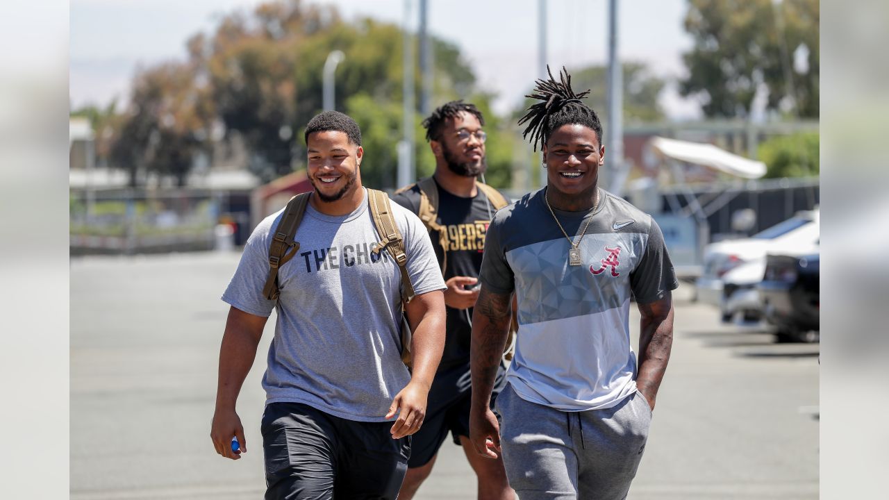 San Francisco 49ers' Jayson DiManche, left, grabs the jersey of Reuben  Foster during practice at an NFL football training camp in Santa Clara,  Calif., Saturday, Aug. 5, 2017. (AP Photo/Jeff Chiu Stock