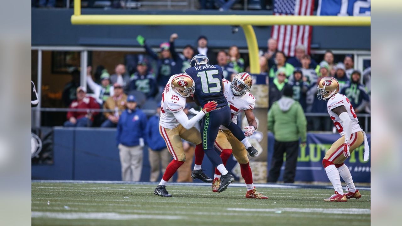 San Francisco 49ers Ronnie Lott pulls down Seattle Seahawks receiver Steve  Largent (80) for a short