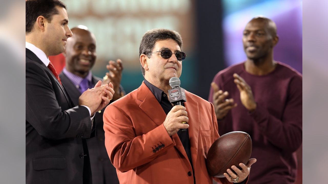 Edward DeBartolo, Jr., former owner of the 49ers, helps Fred Dean, of the  San Diego Chargers and the San Francisco 49ers, unveil his bust at the Pro  Football Hall of Fame 2008