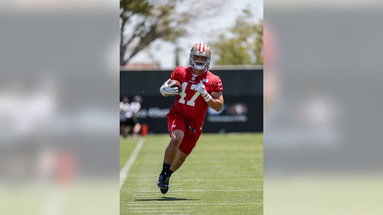 San Francisco 49ers fullback Tyler McCloskey (47) runs for a