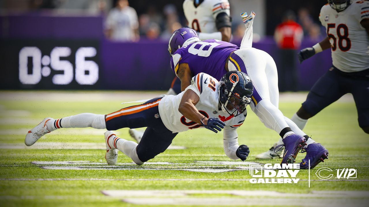 Chicago Bears wide receiver Darnell Mooney (11) carries the ball during the  second half of an NFL football game against the Minnesota Vikings, Sunday,  Oct. 9, 2022 in Minneapolis. (AP Photo/Stacy Bengs