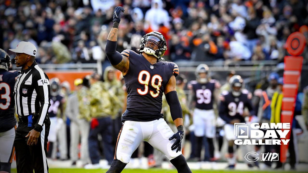 November 21, 2021: Chicago, Illinois, U.S. - Bears #36 DeAndre  Houston-Carson tackles Ravens #89 Mark Andrews during the NFL Game between  the Baltimore Ravens and Chicago Bears at Soldier Field in Chicago