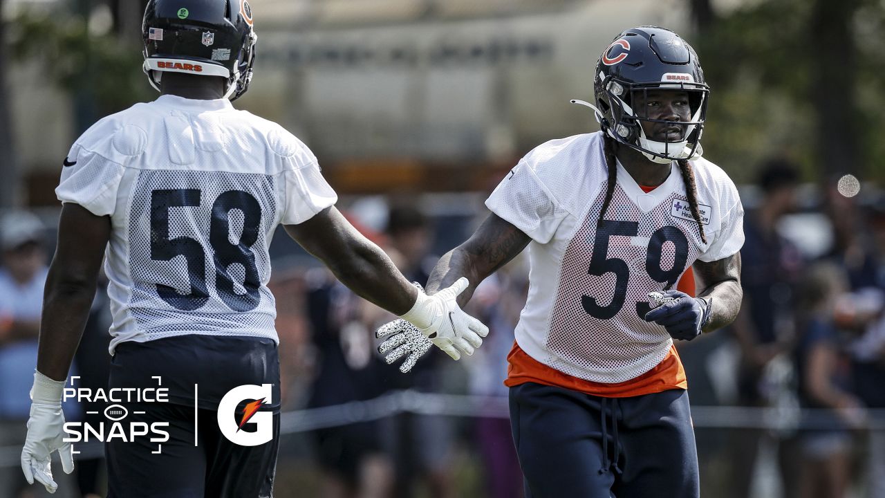 LAKE FOREST, IL - AUGUST 12: Chicago Bears tight end Jimmy Graham (80)  battles with Chicago Bears tight end Scooter Harrington (49) in action  during a joint practice between the Chicago Bears