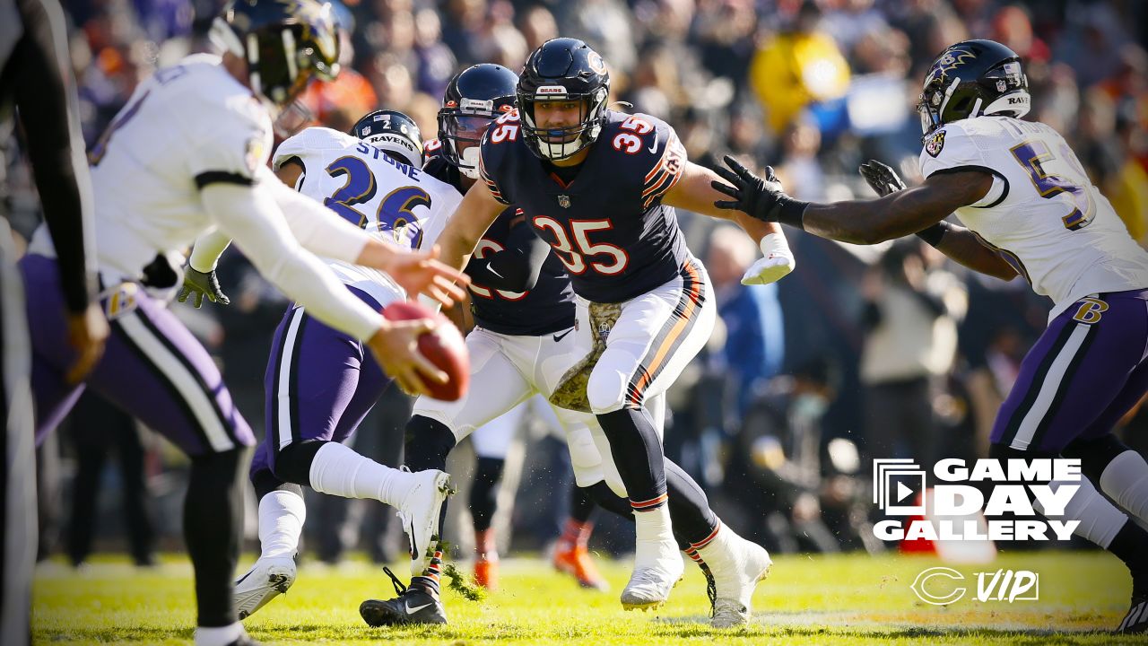 November 21, 2021: Chicago, Illinois, U.S. - Bears #36 DeAndre  Houston-Carson tackles Ravens #89 Mark Andrews during the NFL Game between  the Baltimore Ravens and Chicago Bears at Soldier Field in Chicago