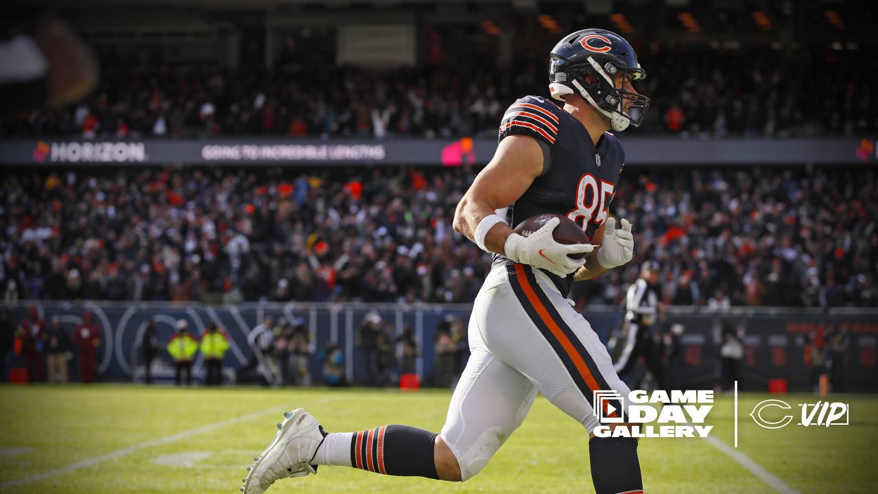 CHICAGO, IL - NOVEMBER 13: Chicago Bears quarterback Justin Fields (1)  signs autographs before a game between the Detroit Lions and the Chicago  Bears on November 13, 2022 at Soldier Field in