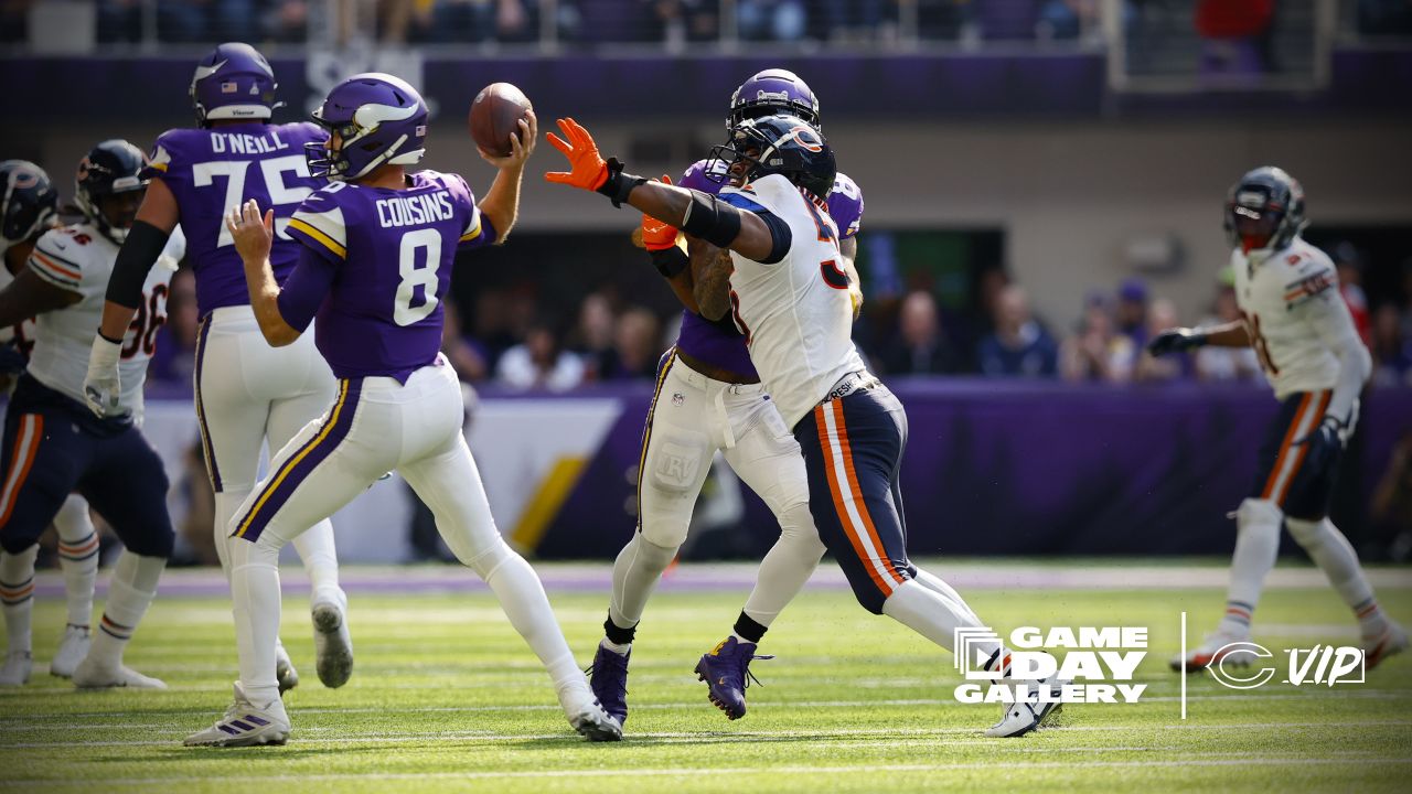 Chicago Bears wide receiver Darnell Mooney (11) carries the ball during the  second half of an NFL football game against the Minnesota Vikings, Sunday,  Oct. 9, 2022 in Minneapolis. (AP Photo/Stacy Bengs