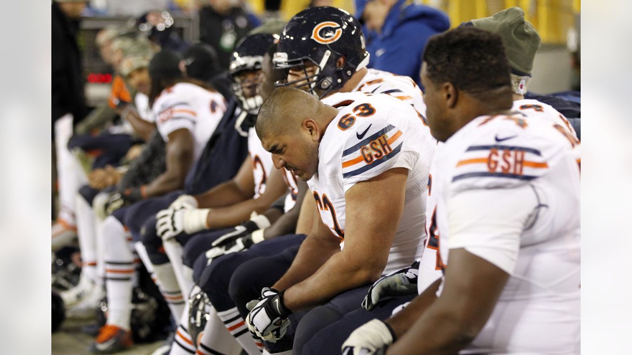 Chicago Bears defensive end Julius Peppers (90) sits on the bench