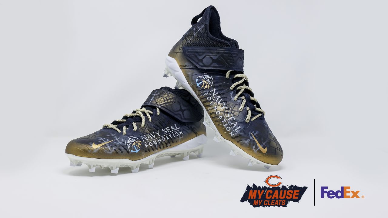 Navy blue and shop gold youth football cleats