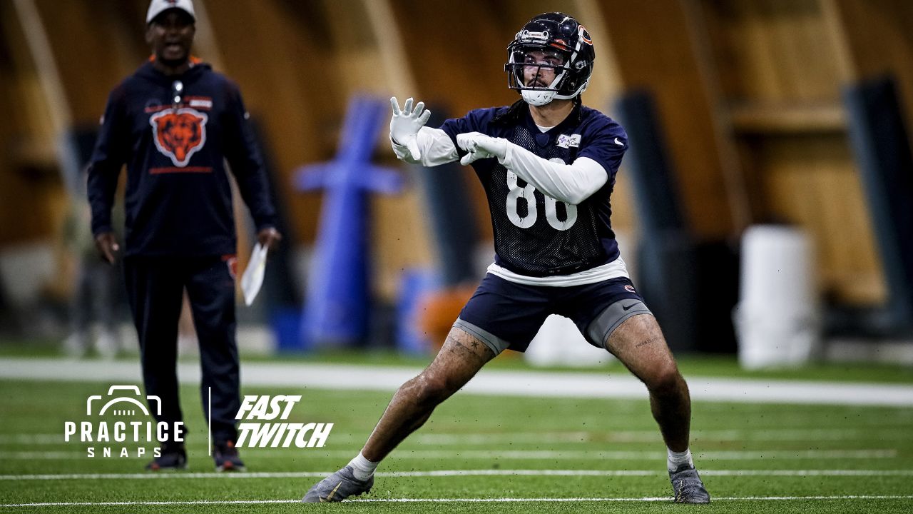 Bears QB Justin Fields greets kids after offseason training