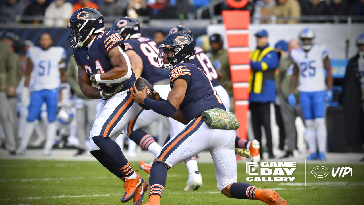 CHICAGO, IL - NOVEMBER 13: Chicago Bears quarterback Justin Fields (1)  signs autographs before a game between the Detroit Lions and the Chicago  Bears on November 13, 2022 at Soldier Field in