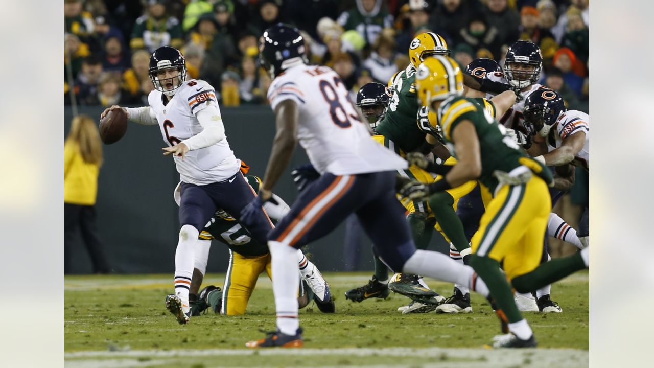 Green Bay Packers defensive tackle Jordan Miller (L) sacks Chicago Bears  quarterback Jay Cutler for a 5-yard loss during the third quarter at  Soldier Field on December 16, 2012 in Chicago. The