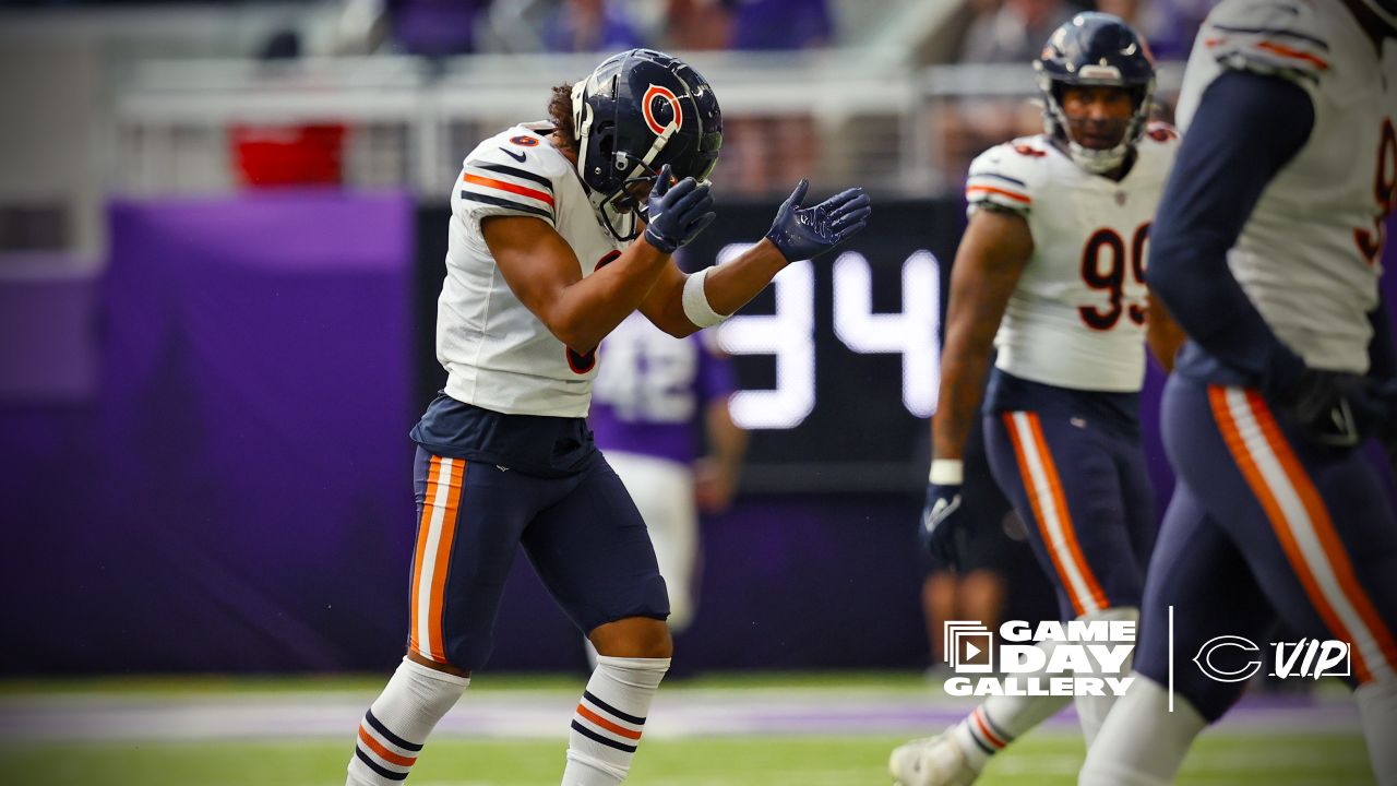 Chicago Bears wide receiver Darnell Mooney (11) carries the ball during the  second half of an NFL football game against the Minnesota Vikings, Sunday,  Oct. 9, 2022 in Minneapolis. (AP Photo/Stacy Bengs