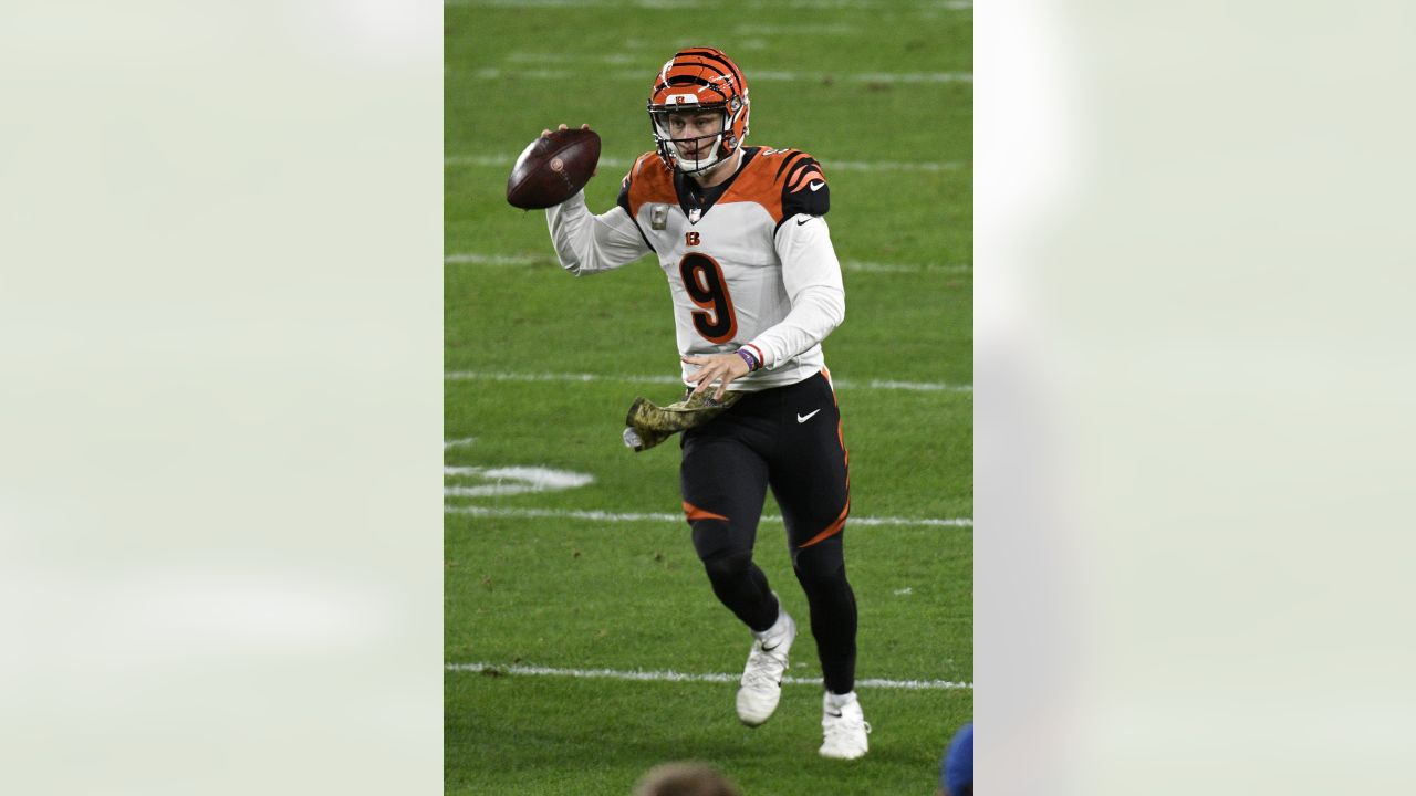 Cincinnati Bengals Michael Johnson holds on the jersey and sacks Pittsburgh  Steelers quarterback Ben Roethlisberger for a lost of eight yards in the  second quarter at Heinz Field in Pittsburgh, Pennsylvania on