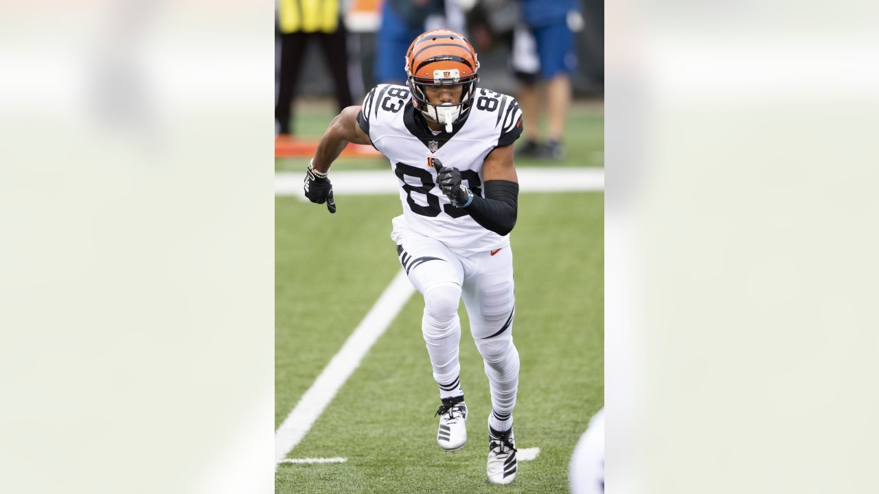 Cincinnati Bengals linebacker Akeem Davis-Gaither (59) carries the ball  after an interception during an NFL wild-card football game against the  Baltimore Ravens on Sunday, Jan. 15, 2023, in Cincinnati. (AP Photo/Emilee  Chinn