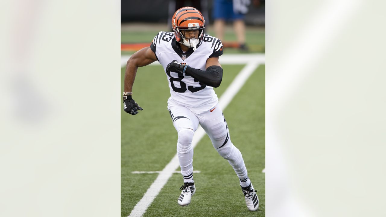 Cincinnati Bengals wide receiver Tyler Boyd (83) runs off the field after  warming up before an