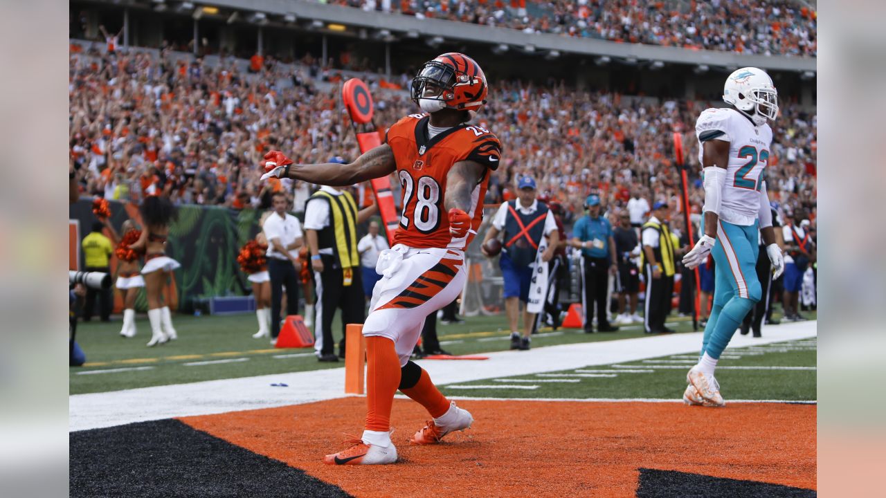 Cincinnati Bengals defensive end Sam Hubbard (94) high fives cornerback Eli  Apple (20) prior to an NFL football game against the Jacksonville Jaguars,  Thursday, Sept. 30, 2021, in Cincinnati. (AP Photo/Emilee Chinn