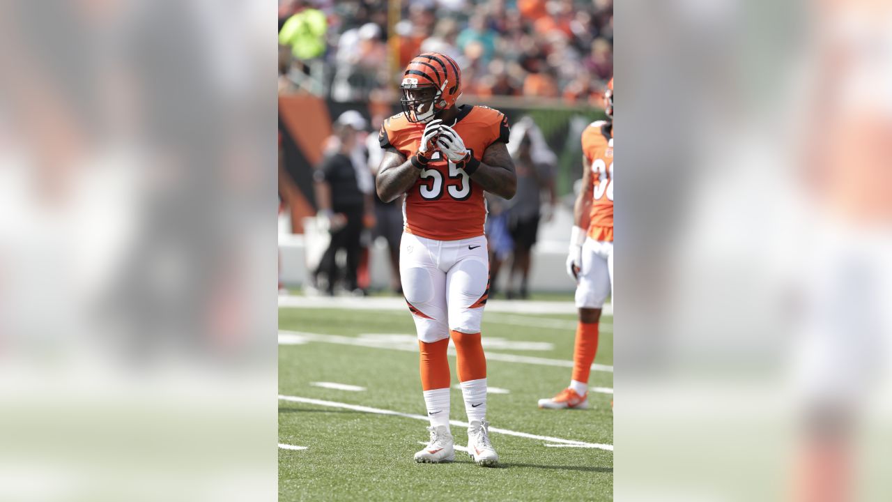 Cincinnati Bengals defensive end Sam Hubbard (94) high fives cornerback Eli  Apple (20) prior to an NFL football game against the Jacksonville Jaguars,  Thursday, Sept. 30, 2021, in Cincinnati. (AP Photo/Emilee Chinn