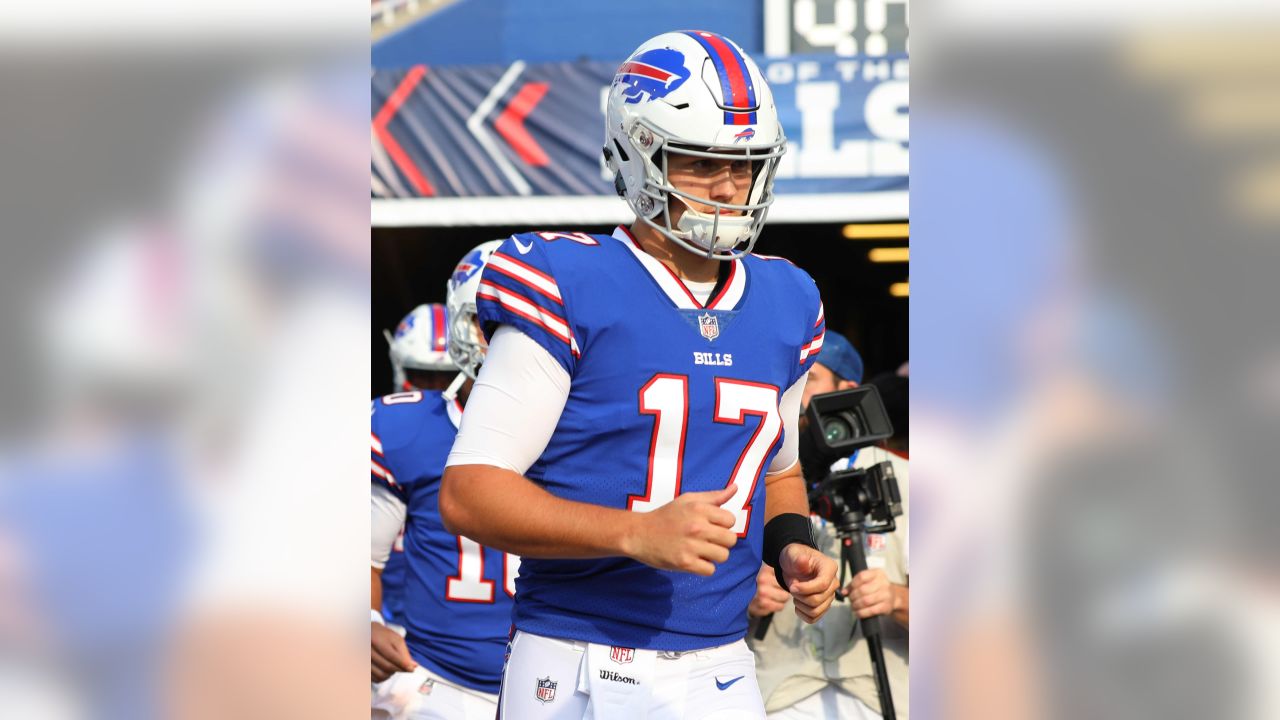 Buffalo Bills quarterback Josh Allen (17) smiles on the sidelines during an  NFL preseason football game against the Carolina Panthers on Friday, Aug.  26, 2022, in Charlotte, N.C. (AP Photo/Rusty Jones Stock