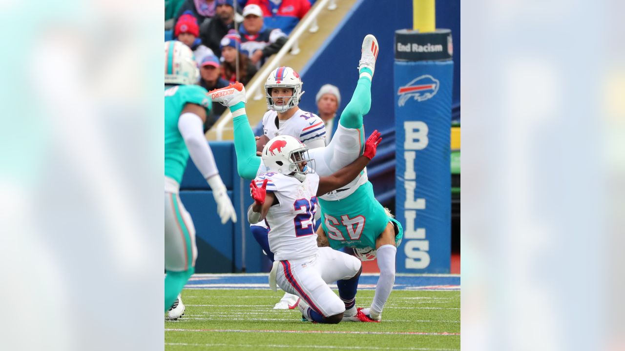 Bills eliminate Dolphins with 56-26 rout; set to host Colts