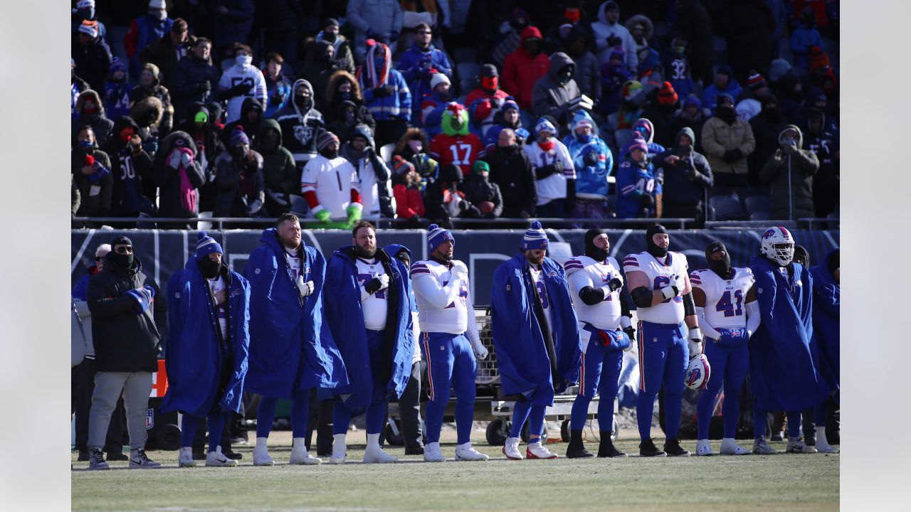 Fans hustle to get to warm after frigid Chicago Bears game at Soldier Field  on Christmas Eve