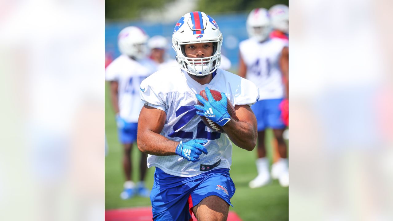 New York Giants running backs Matt Breida (31), Saquon Barkley (26), and  Antonio Williams (21) participate during training camp at the NFL football  team's practice facility, Friday, July 29, 2022, in East