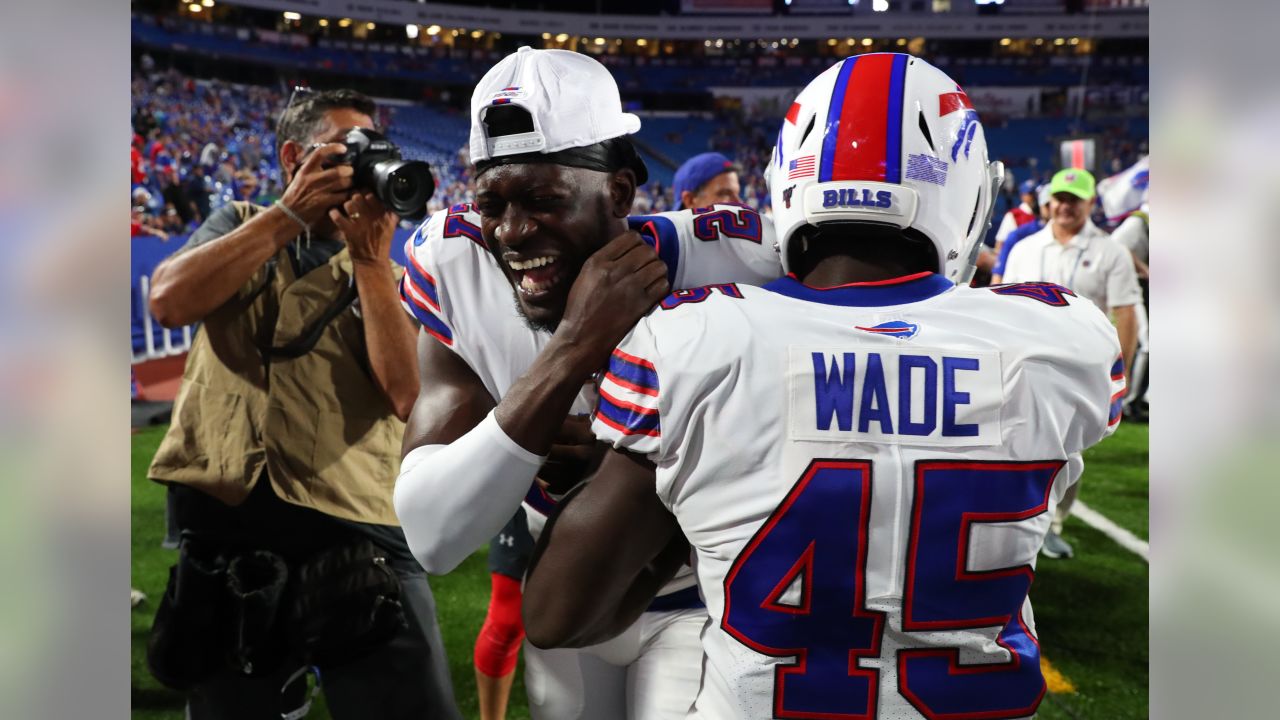 Buffalo Bills' LeSean McCoy, center, celebrates with Christian Wade (45)  after Wade scored a touchdown during the second half of an NFL preseason  football game against the Indianapolis Colts, Thursday, Aug. 8