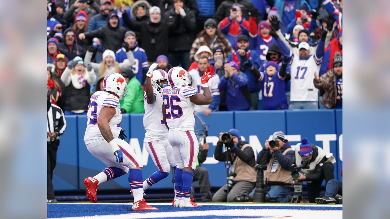 Buffalo Bills running back Devin Singletary (26) warms up before