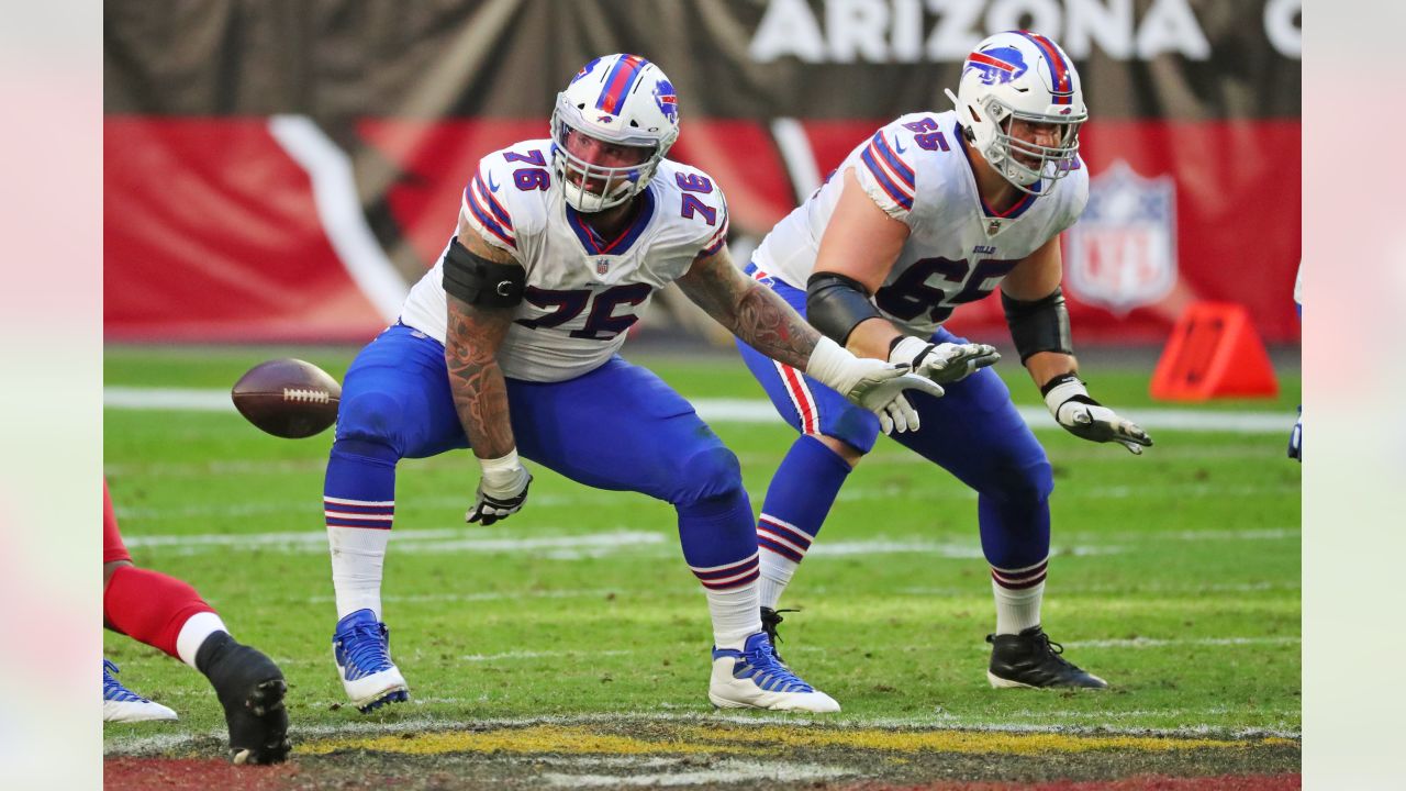 Buffalo Bills guard Ike Boettger (65) runs onto the field for an